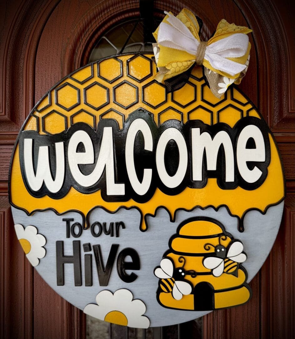Round welcome sign with bees and hive